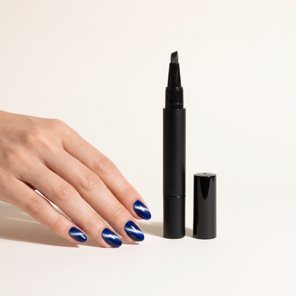 LustrePen cat eye gel pen with nails in Sapphire Hour showing the magnetic silver streak