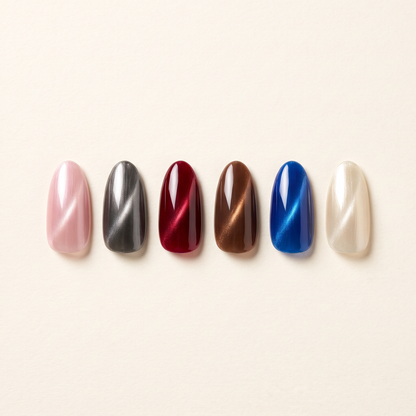 All six LustrePen cat eye shades: Rose Quartz, Onyx Mirror, Scarlet Veil, Mocha Gleam, Sapphire Hour, Champagne Veil