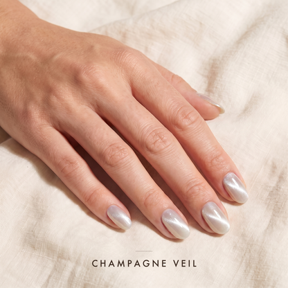 Champagne Veil — pale pearl with a soft silver cat eye streak